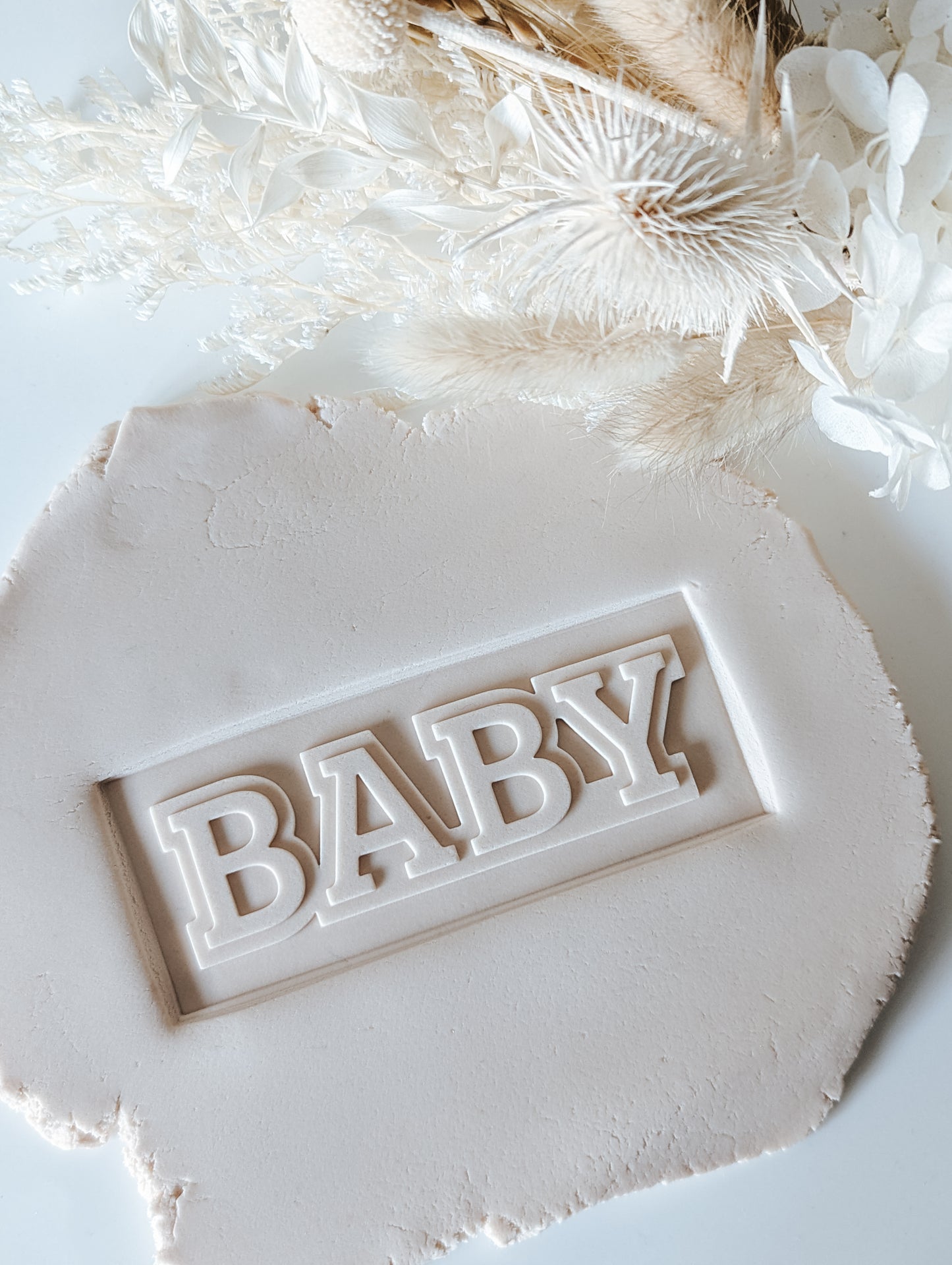 'Baby' dual layer text